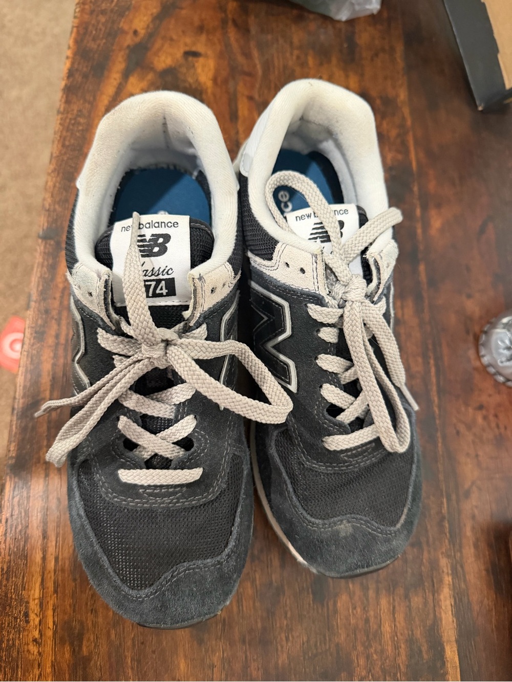 New Balance Womenās Classic 574 Sneakers in Black and White